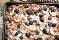 Golden Focaccia with Sun Kissed Tomatoes Olives and Cheese