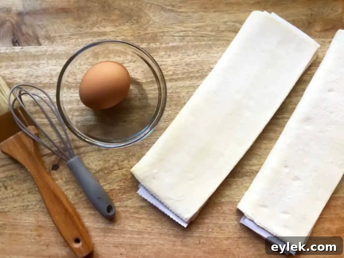 Frozen puff pastry sheet being prepared for cutting into rounds