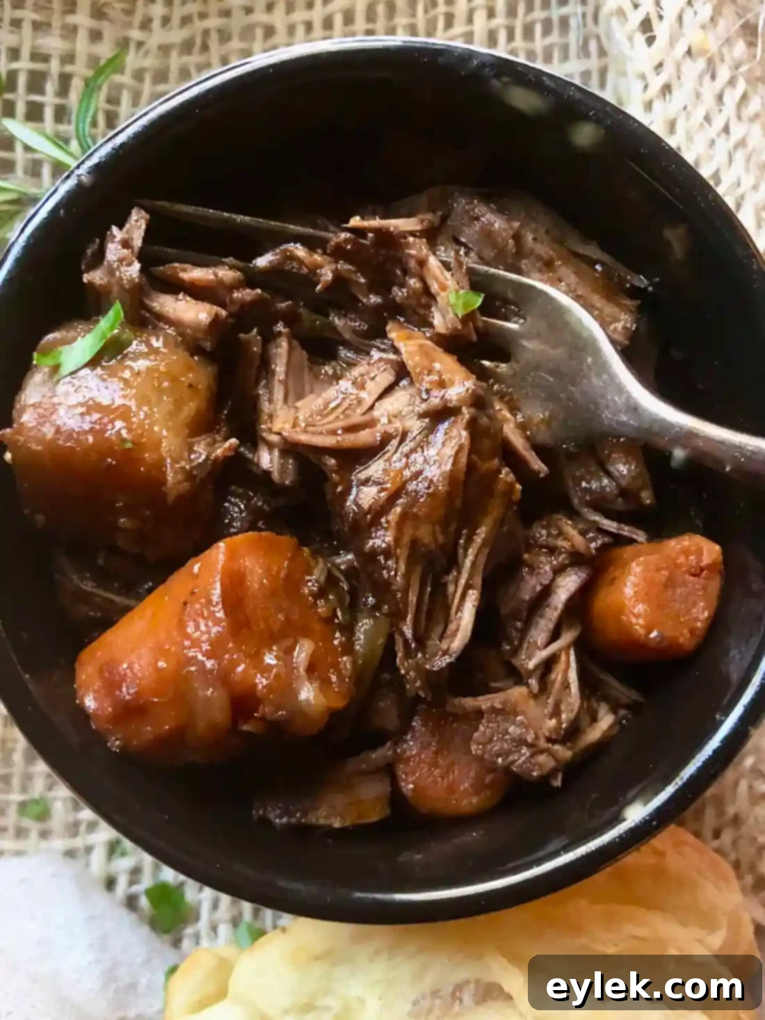 Scrumptious Braised Beef with Flaky Topping served, garnished with herbs