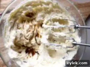 Mixing icing with the milk and flour paste