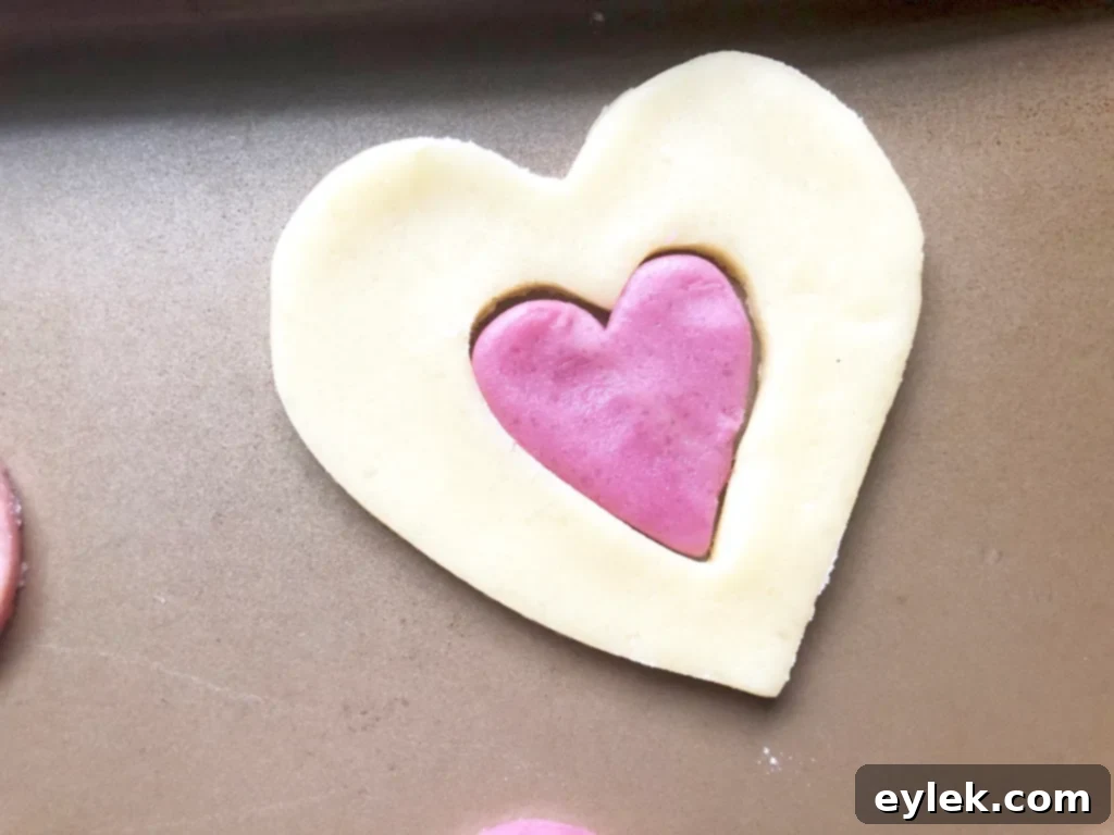 Close-up of unbaked patchwork cookies with sparkling sugar