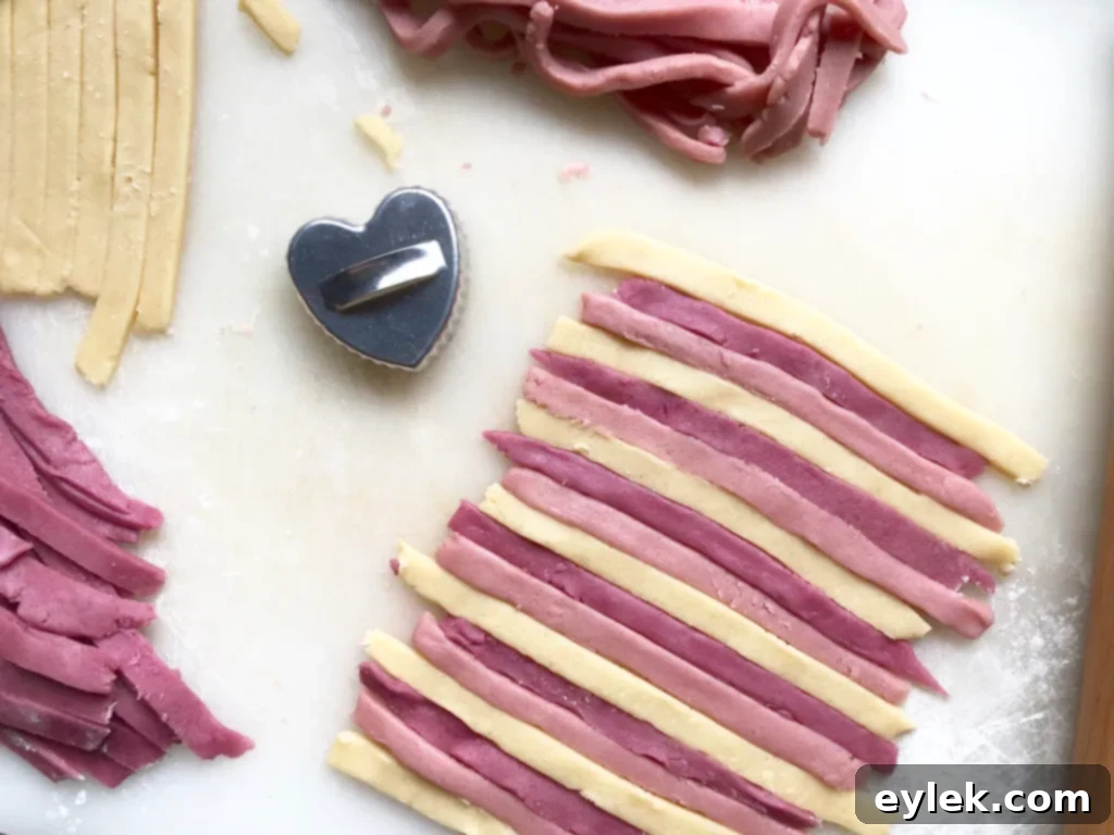 Cookie dough rolled into strips for striped cookies