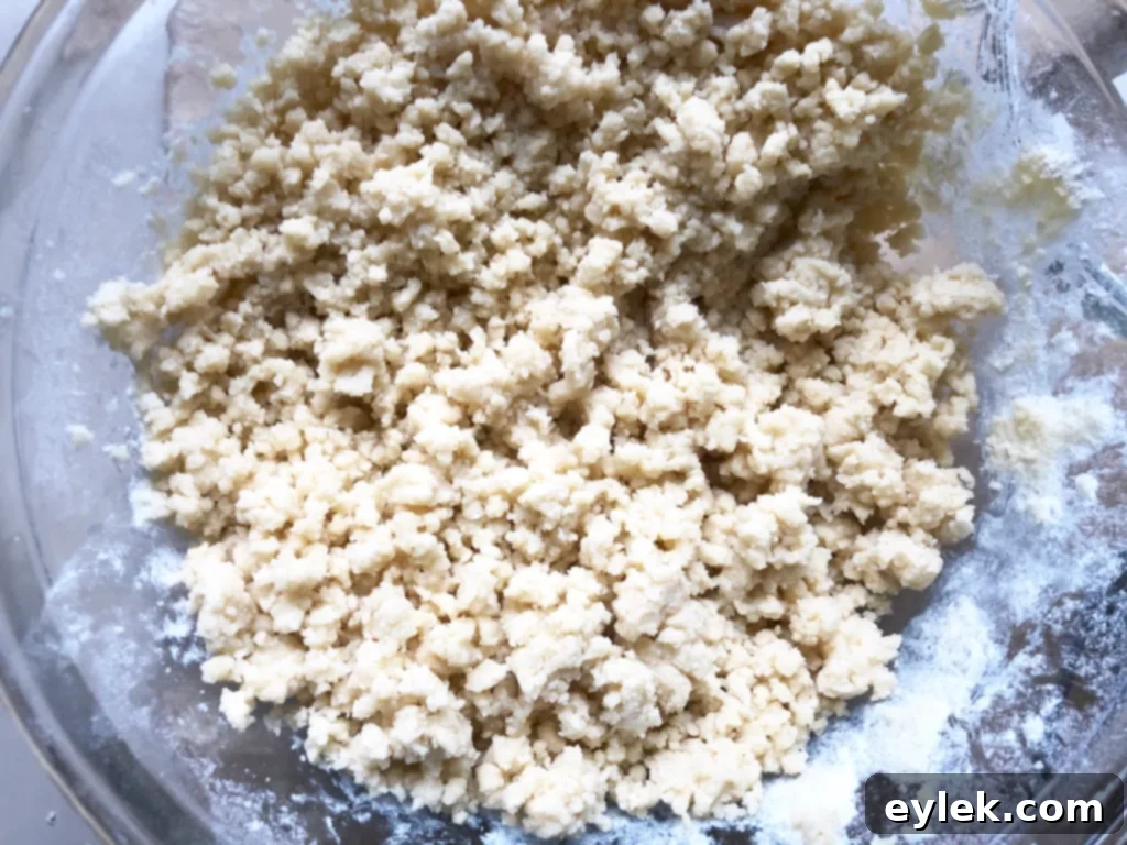 Cookie dough divided into colored portions for decorating