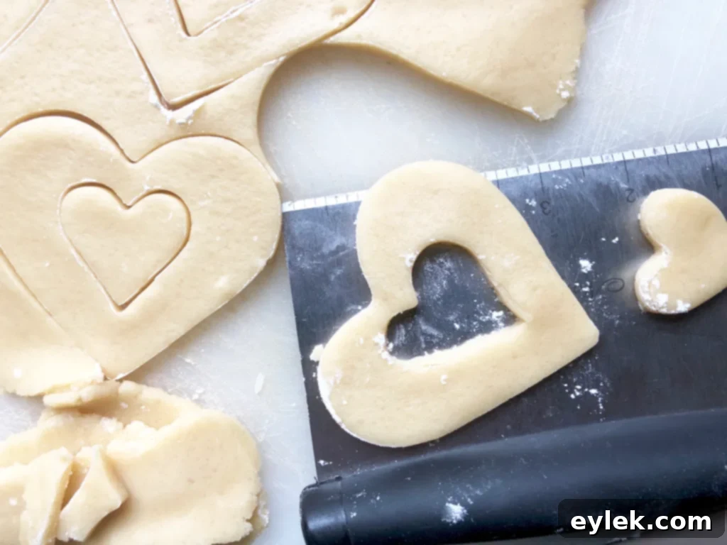 Assembling patchwork heart cookies with contrasting colors