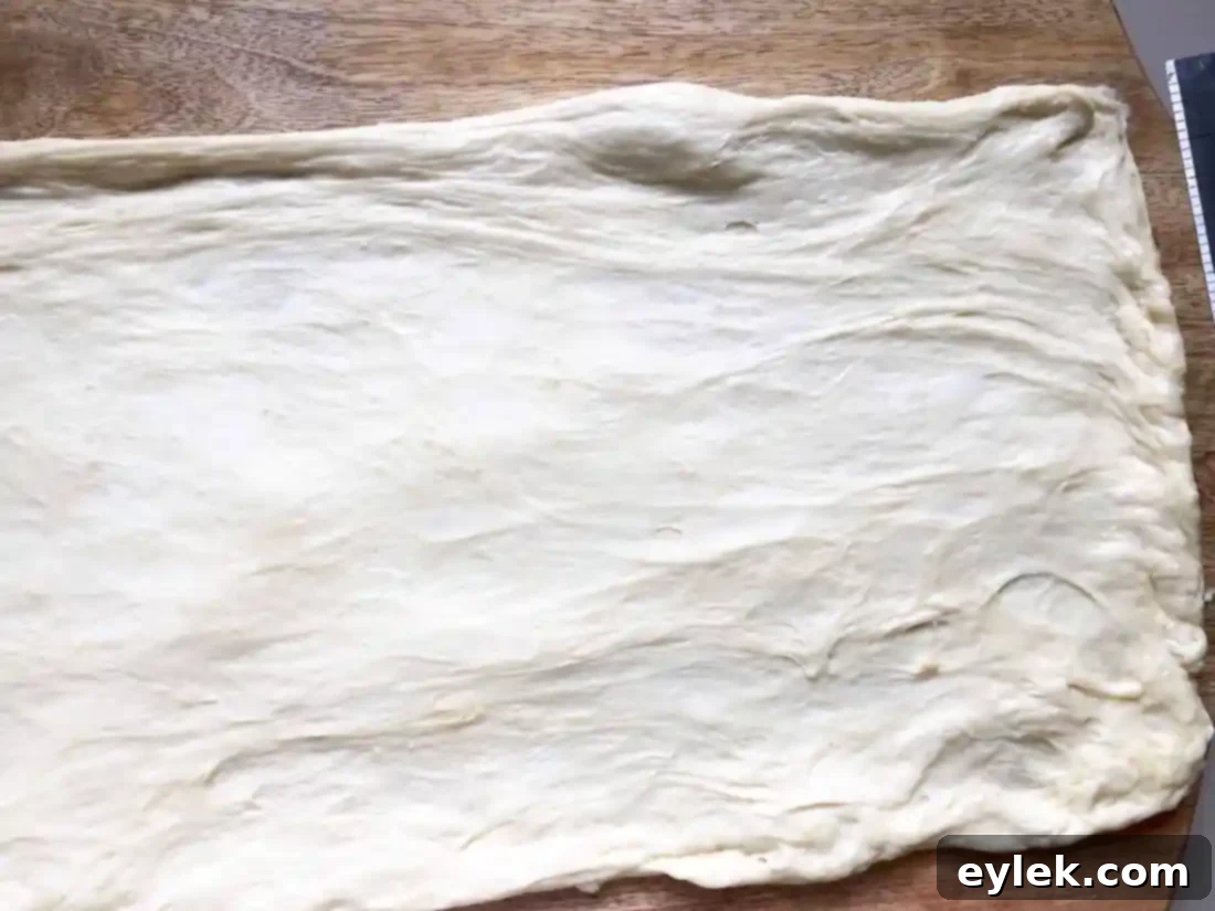 filling ingredients spread on pane bianco dough