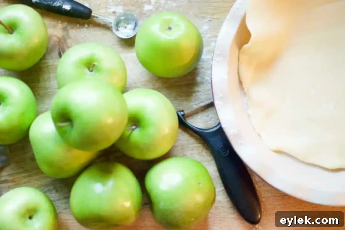 Peeled and sliced Granny Smith apples ready for Ina Garten's Deep Dish Apple Pie