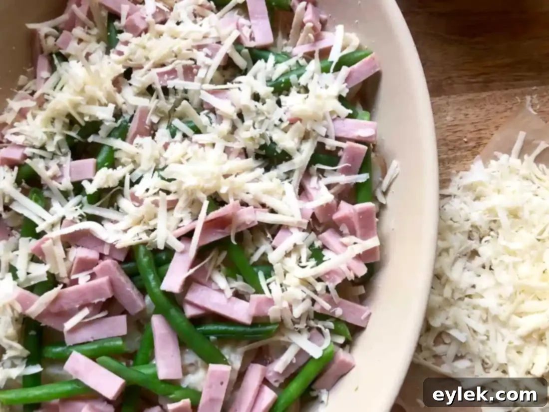 layers of potato gratin with haricots verts & ham