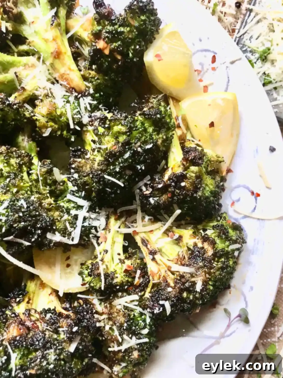 Smoky Marinated Broccoli Spears 14 Grilled Marinated Broccoli Spears in a bowl with lemon