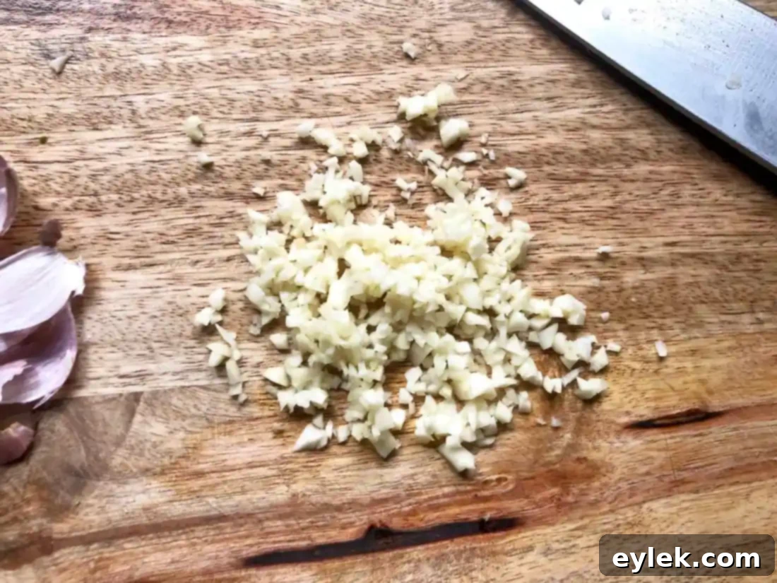 Smoky Marinated Broccoli Spears 4 Ingredients for the marinade being measured into a bowl