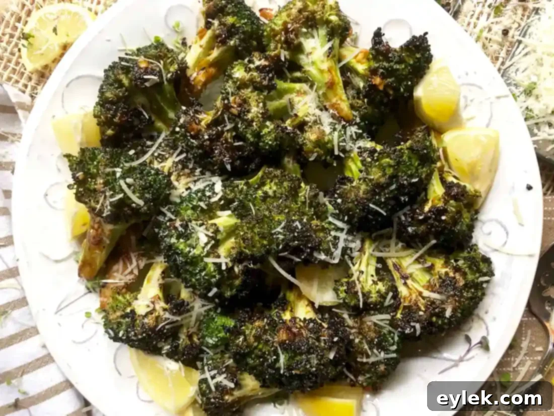 Smoky Marinated Broccoli Spears 10 Grilled Marinated Broccoli Spears served on a white platter