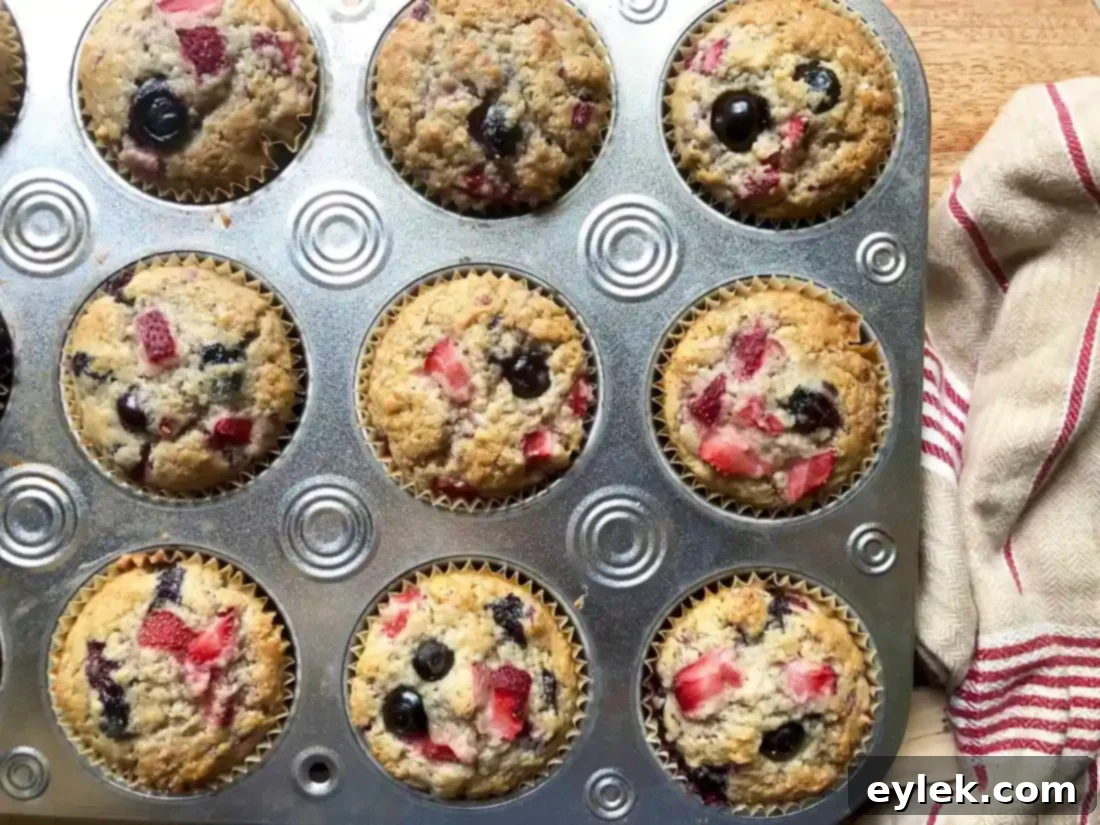 Triple Berry Muffins Gluten Free or Classic 11 A perfectly baked gluten-free triple berry muffin, close up