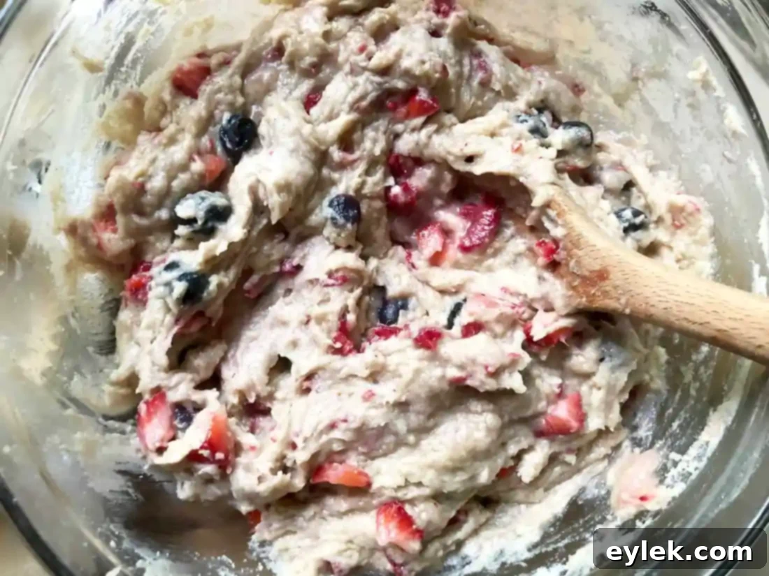 Triple Berry Muffins Gluten Free or Classic 8 Muffin tin prepared with paper liners, ready for batter