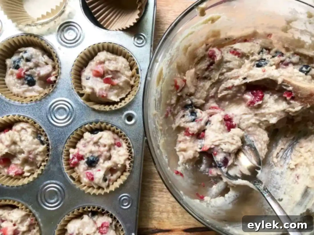Triple Berry Muffins Gluten Free or Classic 9 Muffin tin filled with delicious berry muffin batter before baking
