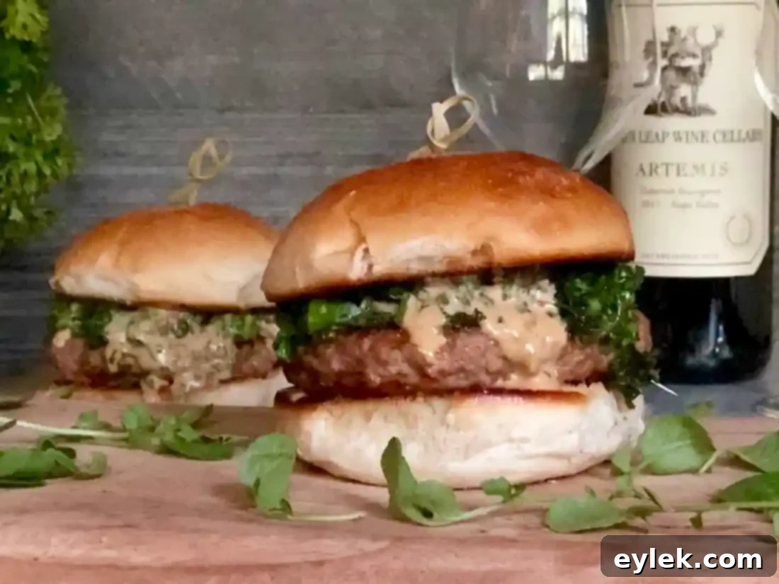 Italian pork burger cut in half, showing the inside