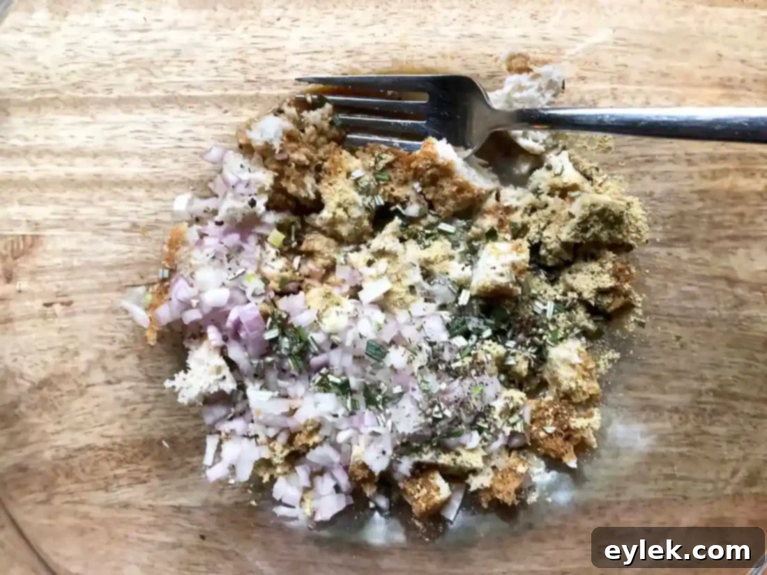 Forming a pork burger patty with hands