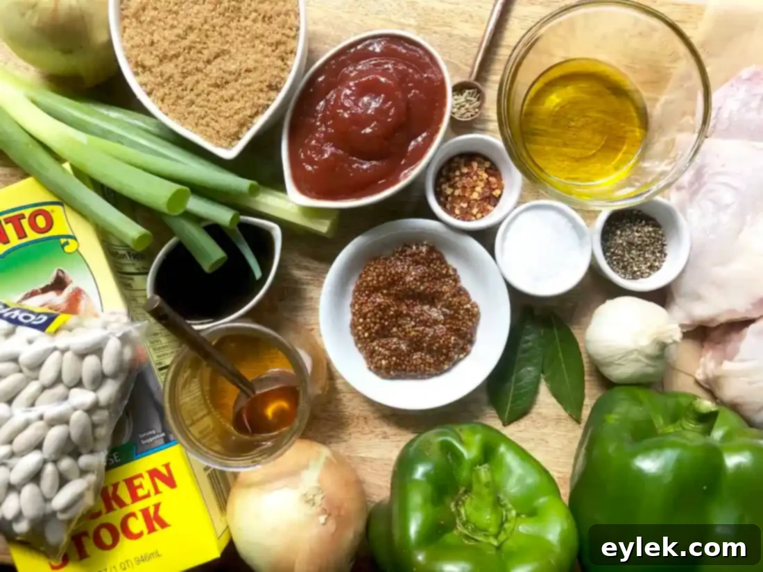 chicken thighs with barbecue beans cooking on stovetop