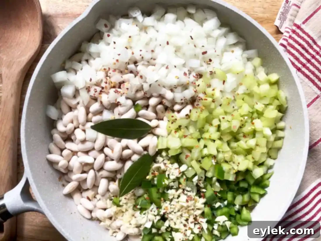 barbecue beans simmering with aromatics