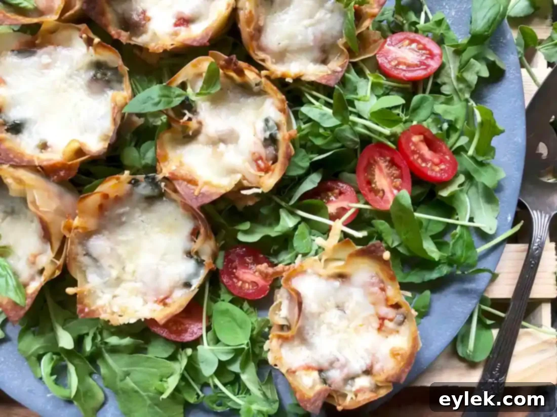 A vibrant plate of Quick & Easy Veggie Lasagna Cups with fresh basil, ready to be served as a meal.