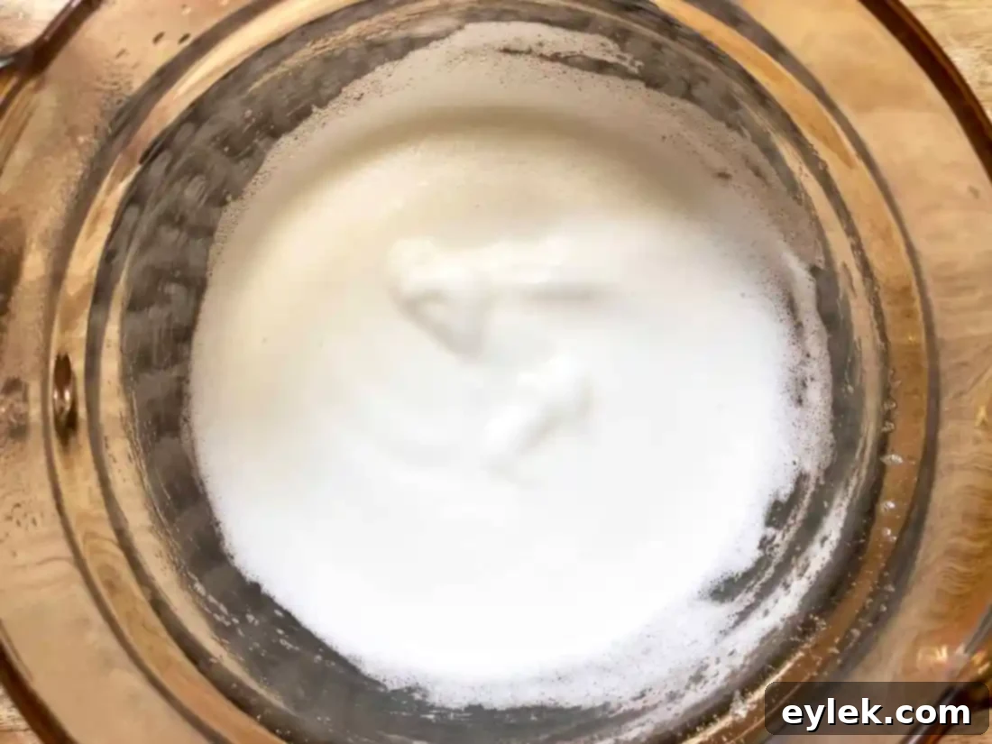 Swiss meringue mixture in a bowl
