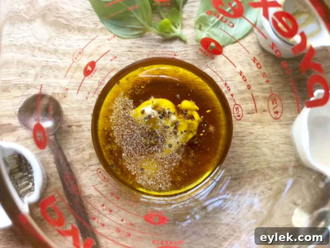 Ingredients for balsamic vinaigrette, including white balsamic vinegar