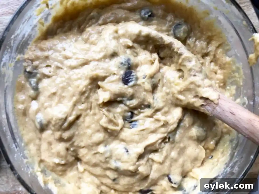 Muffin batter in prepared tin