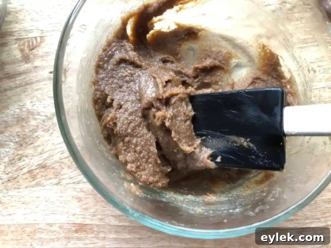 cinnamon topping spread on dough