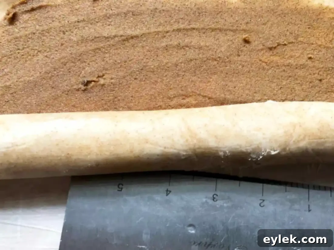 cinnamon swirl slices on a baking sheet