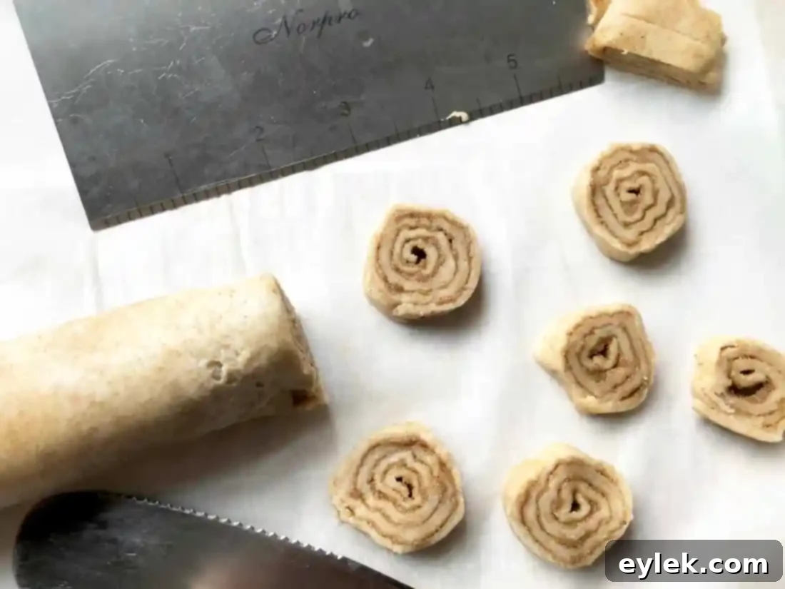 cinnamon swirl slices chilling on baking sheet