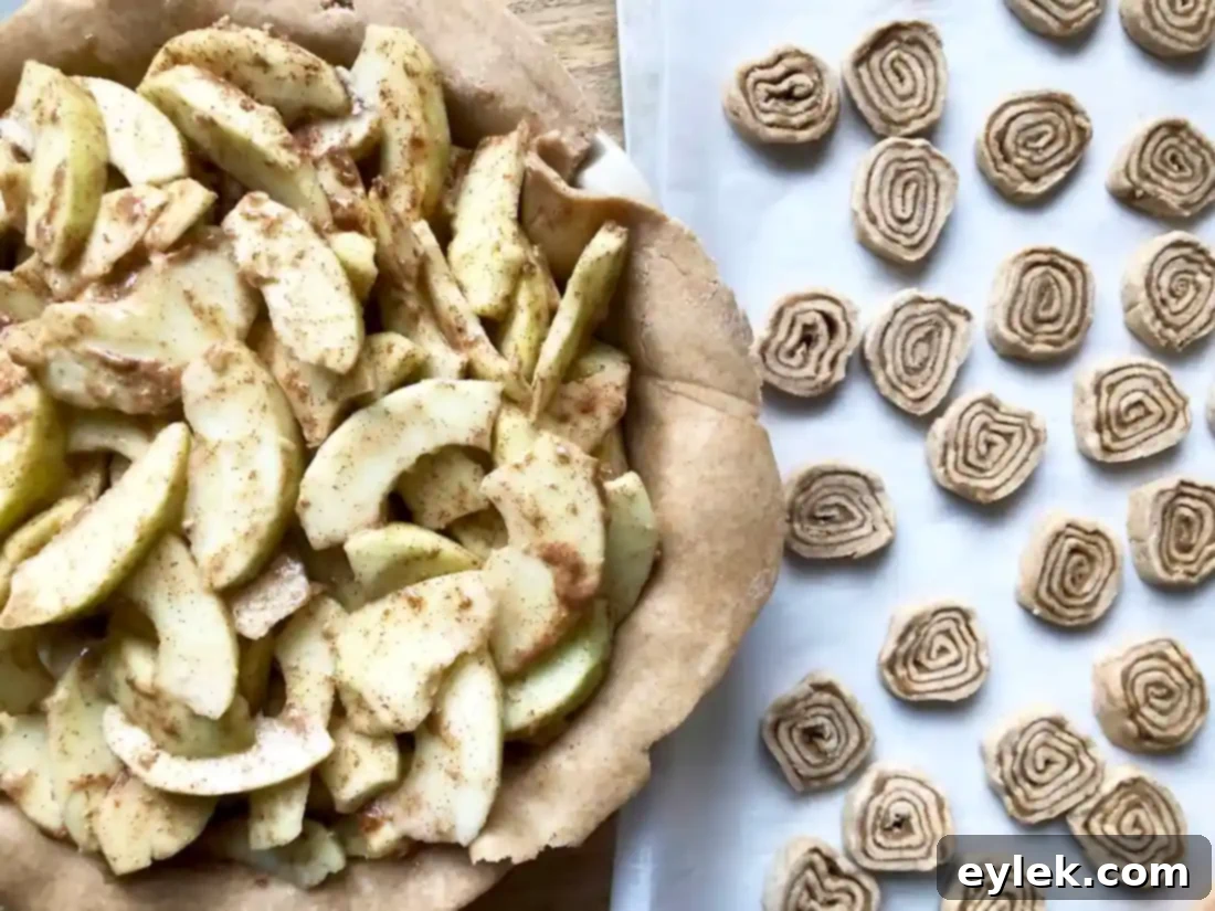 cinnamon swirl slices arranged on top of apple pie