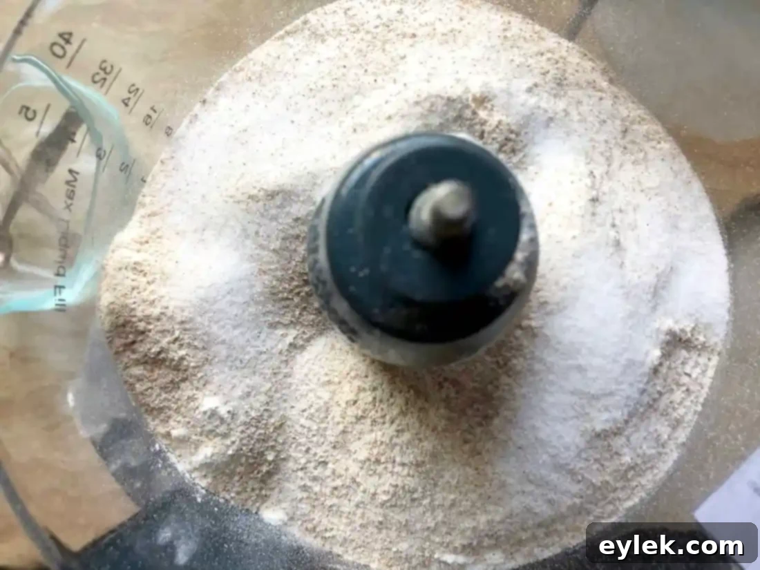 pie crust dough being mixed in a bowl