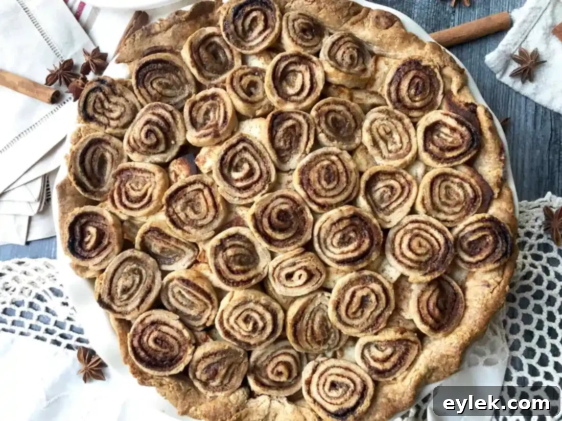 cinnamon swirl apple pie, baked and cooling