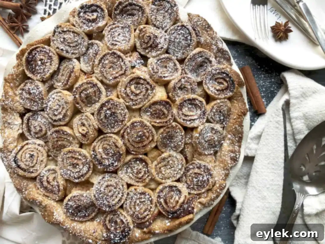 Cinnamon Swirl Apple Pie on a cutting board