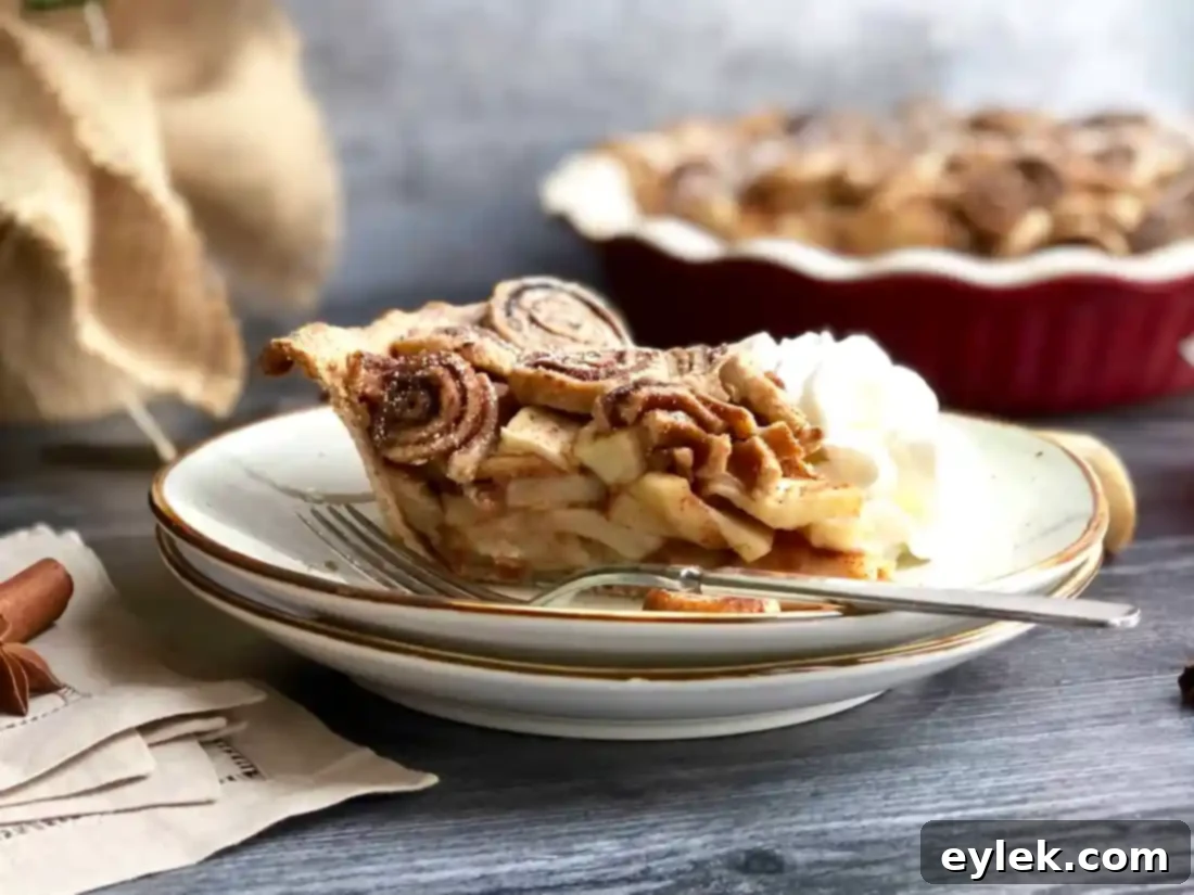 Cinnamon Swirl Apple Pie with a mini cinnamon bun