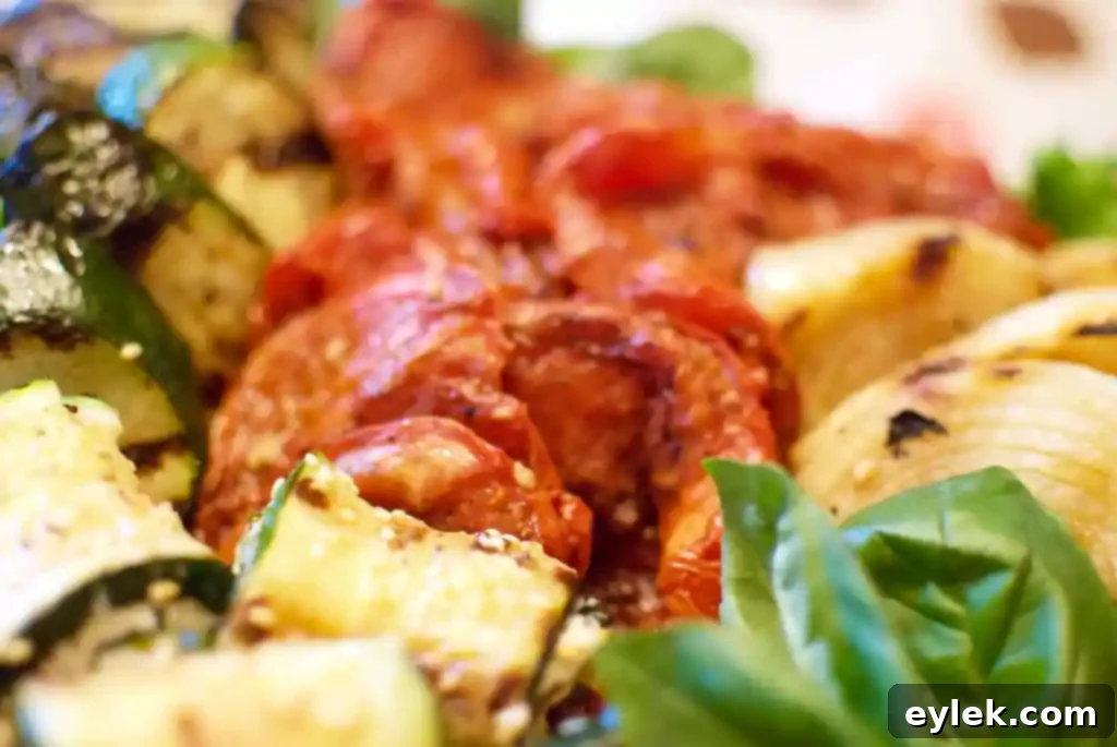 ina garten’s slow roasted tomatoes in a caprese salad