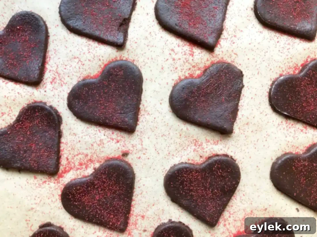 dark chocolate wafer cookies with red sugar topping