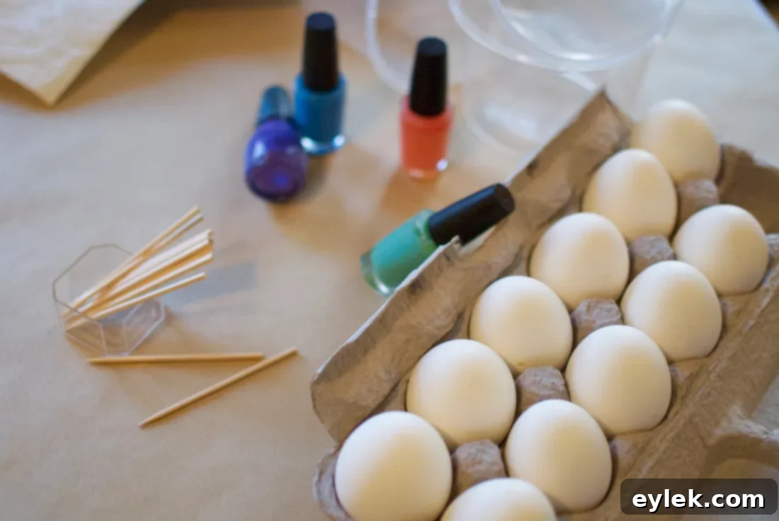Beautifully marbleized Easter eggs, displaying intricate patterns created with nail polish.