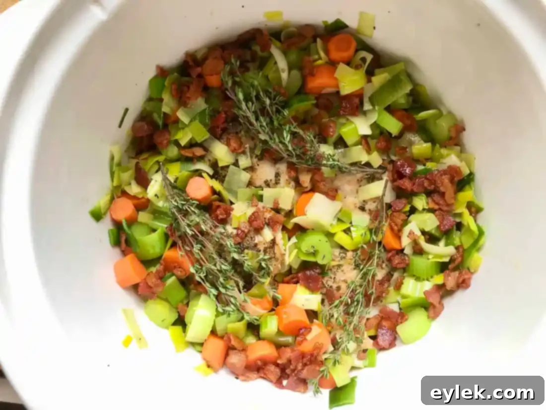 All ingredients combined in the slow cooker, ready for the initial simmer