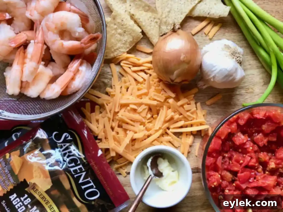 Easy Homemade Queso Dip with Shrimp - A luxurious, cheesy dip with succulent shrimp, perfect for parties.