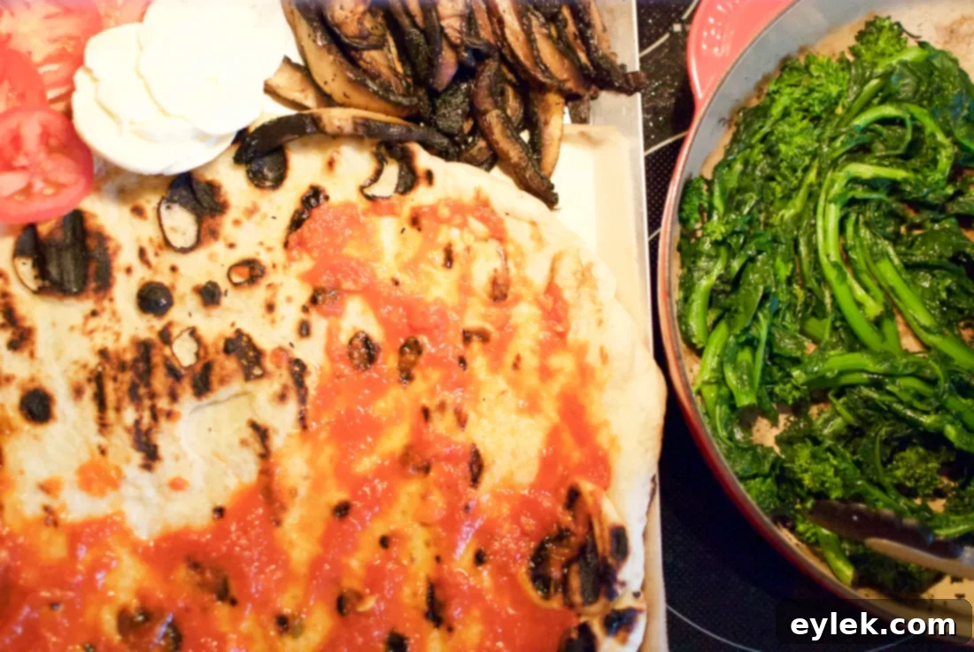 Prepped broccoli rabe with garlic and red pepper flakes in a pan