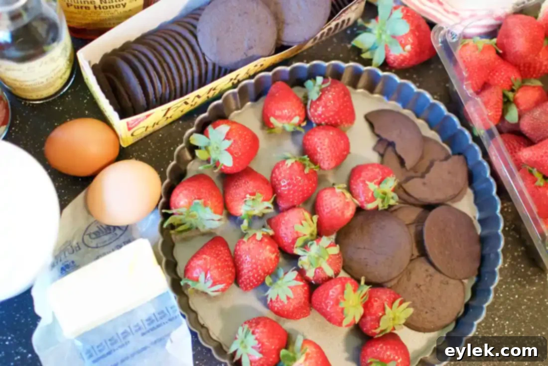 Mascarpone Tart with Strawberries: A beautifully presented tart showcasing fresh berries atop a creamy filling and chocolate crust.