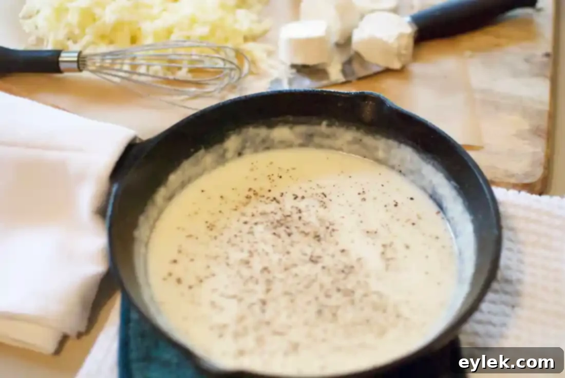 queso fundido with roasted poblano vinaigrette