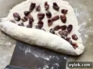 Sealing the edges of no-knead olive bread dough