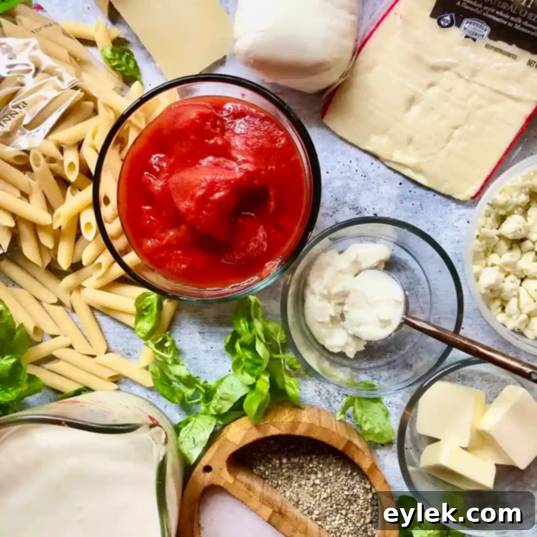 Penne with Tomato, Cream & Five Cheeses, fresh from the oven, golden and bubbly.