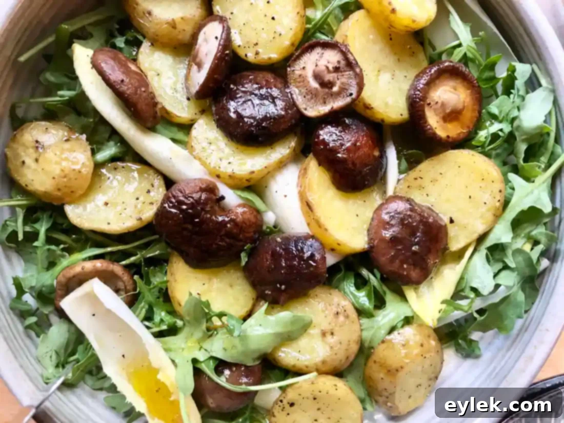 gruyère fondue salad with roasted potatoes & mushrooms