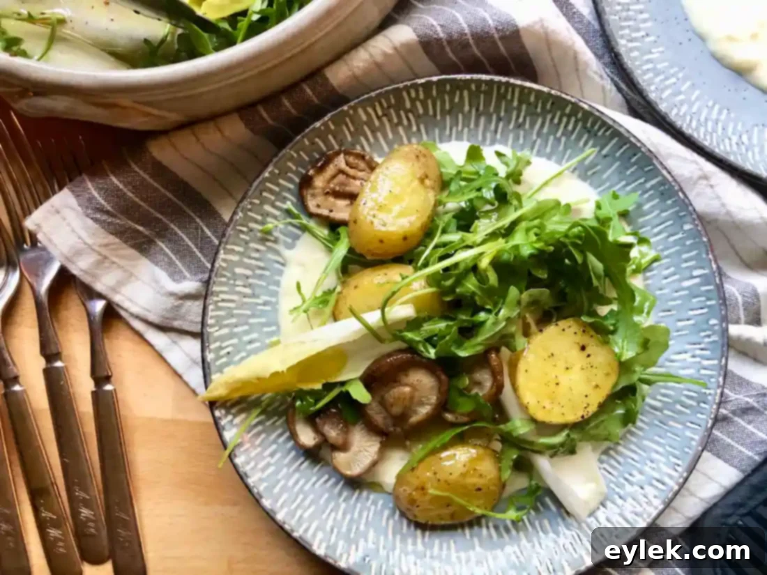 gruyère fondue salad with roasted potatoes & mushrooms