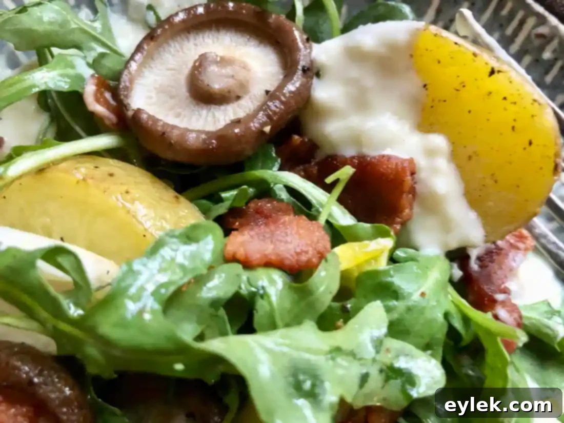 gruyère fondue salad with roasted potatoes & mushrooms