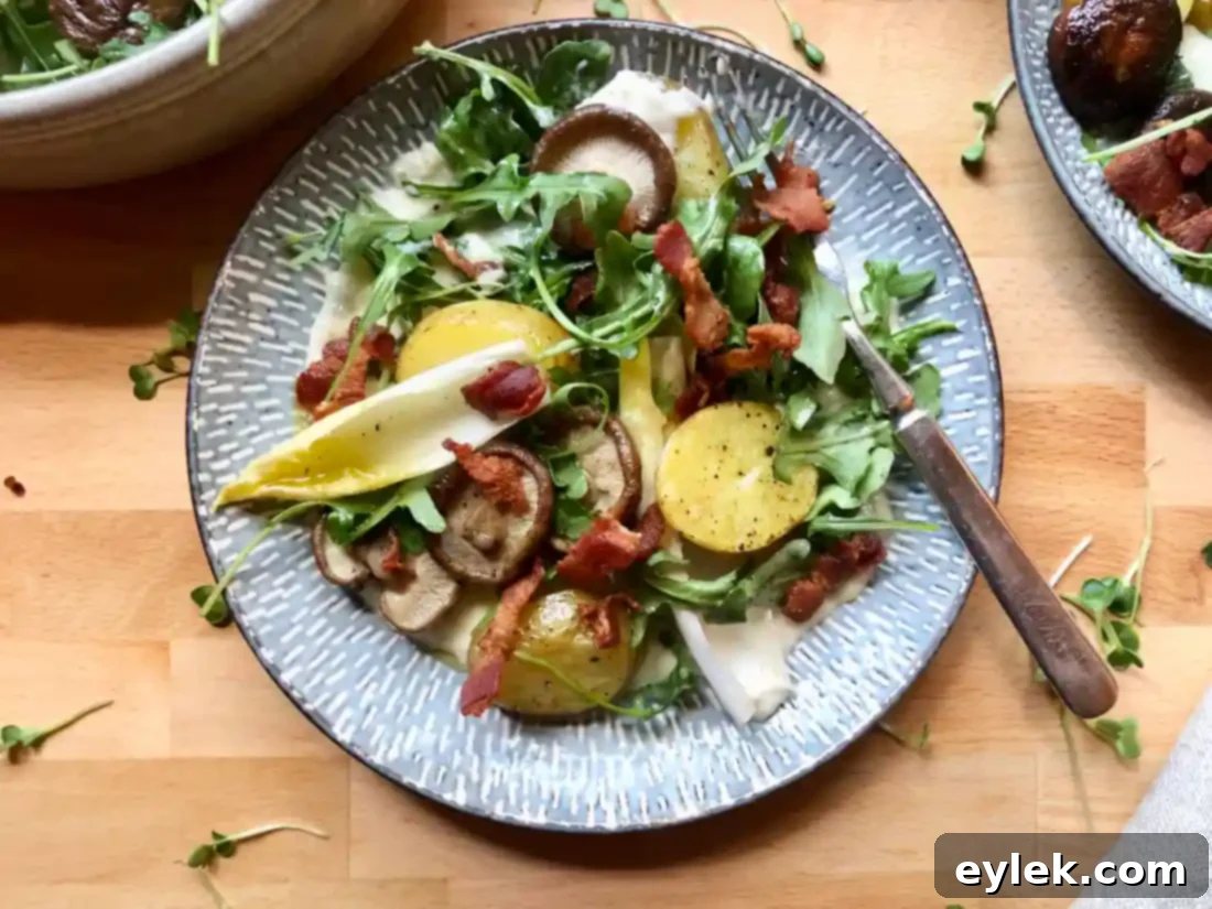 gruyère fondue salad with roasted potatoes & mushrooms