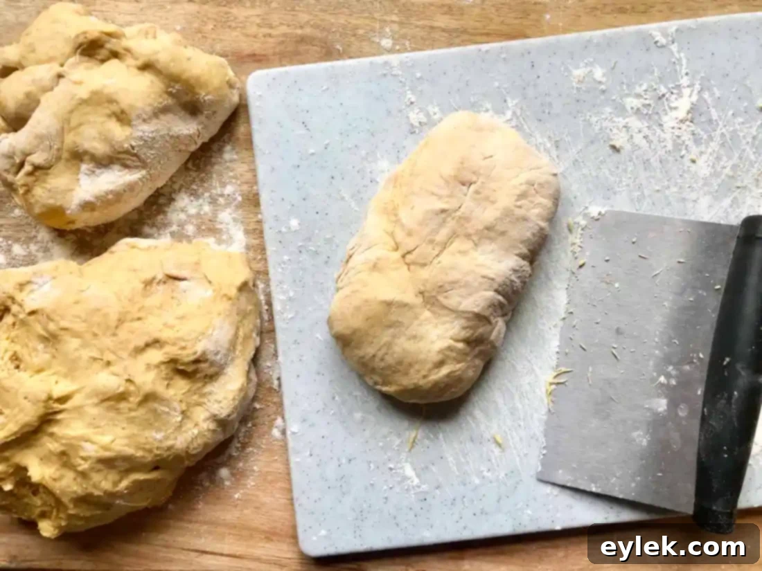 shaping the pumpkin roll dough