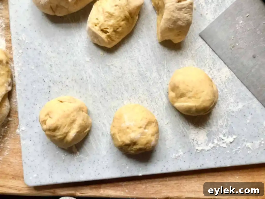 rising pumpkin rolls in baking pan
