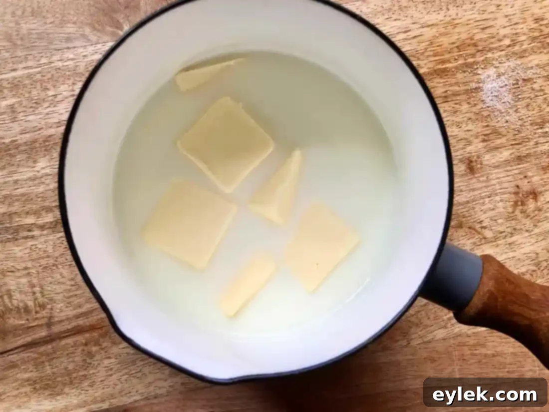 warm milk and butter for pumpkin rolls